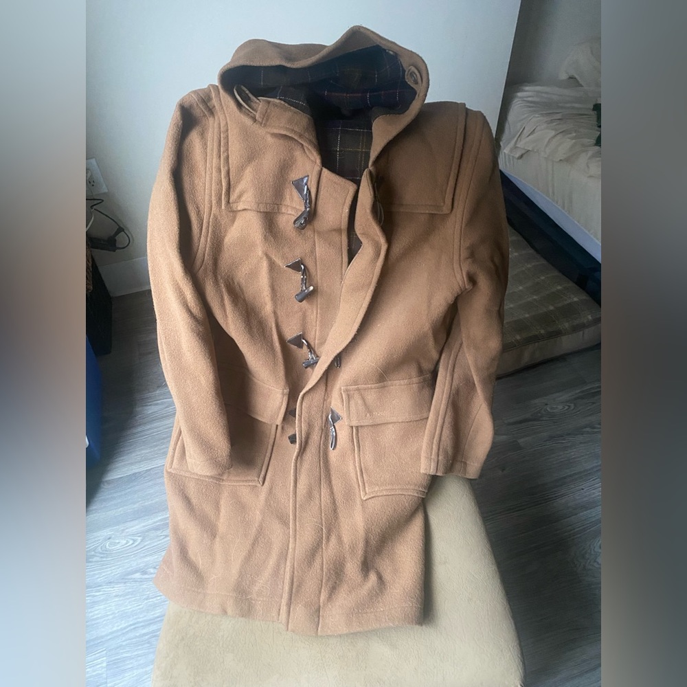 Beige Barbour hooded coat